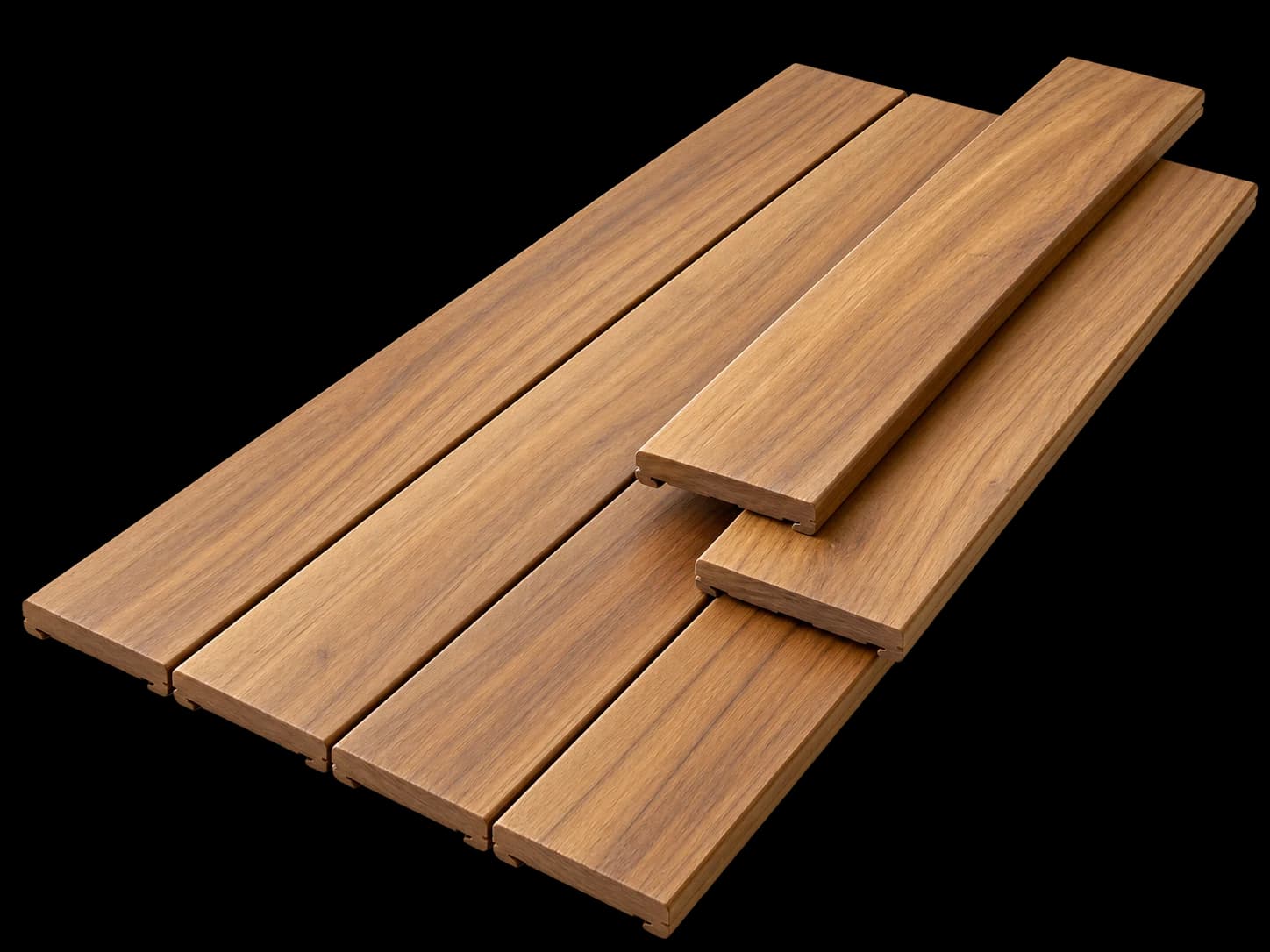 An angled hardwood decking sample with visible natural grain and narrow board gaps